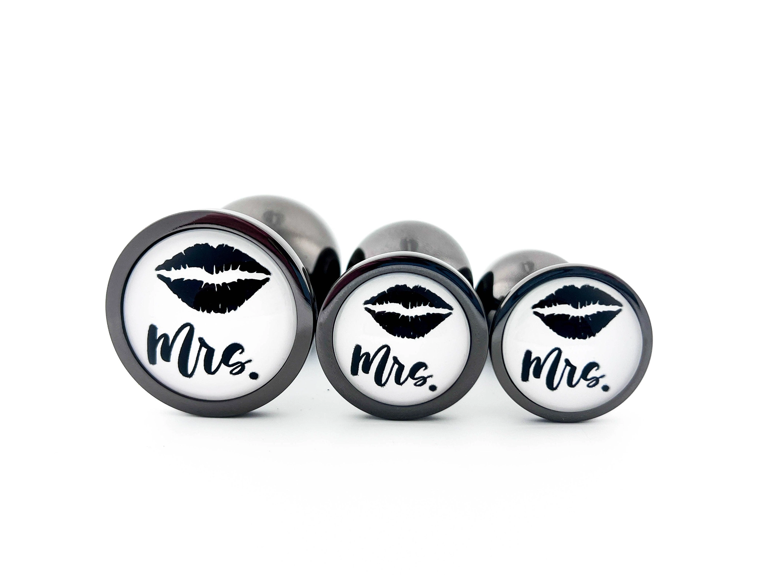His or Hers Butt Plugs Featuring a Mustache or Sexy Lips