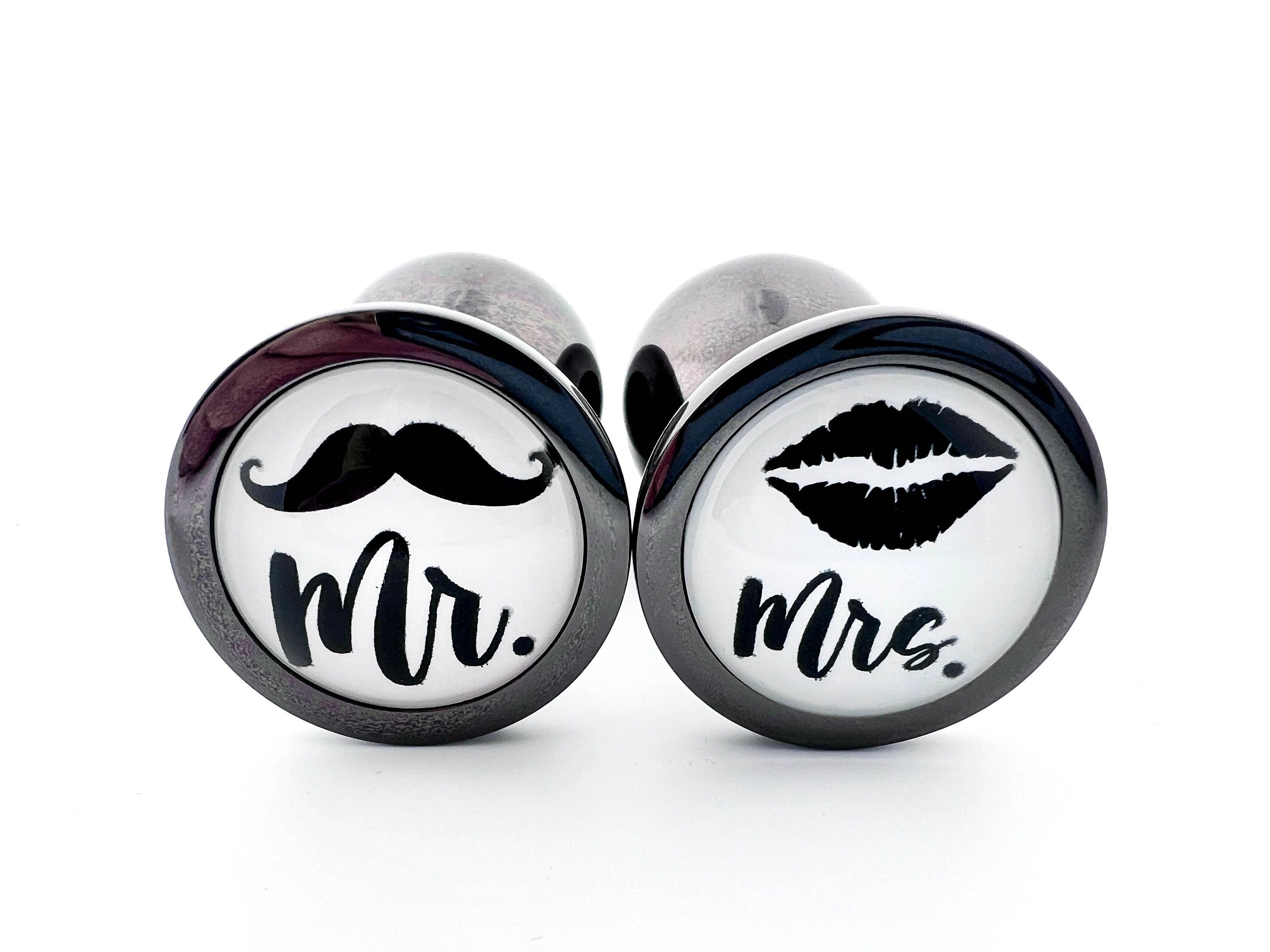 His or Hers Butt Plugs Featuring a Mustache or Sexy Lips