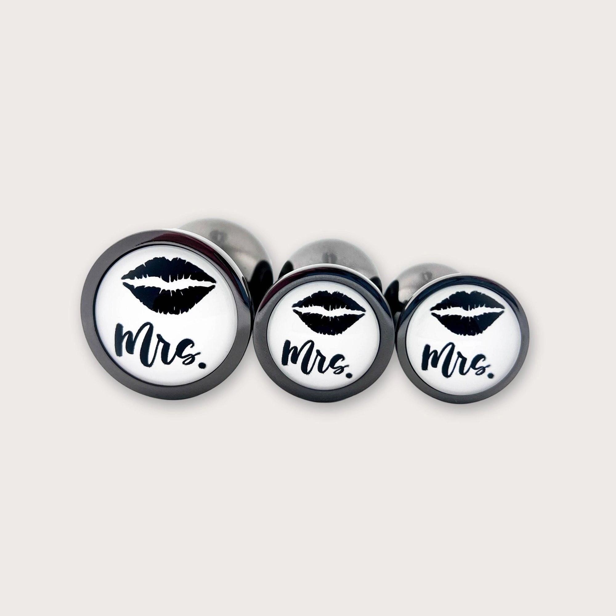 His or Hers Butt Plugs Featuring a Mustache or Sexy Lips